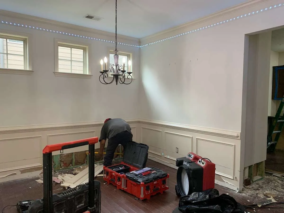 Restoration technician with professional equipment in Plainsboro